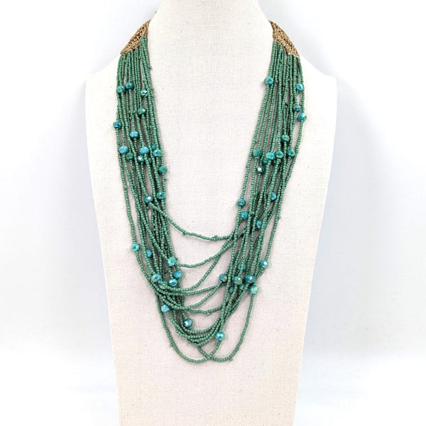 Luxe multistrand necklace with twine woven finishing