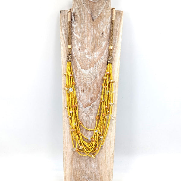 Luxe multistrand necklace with twine rope finishing