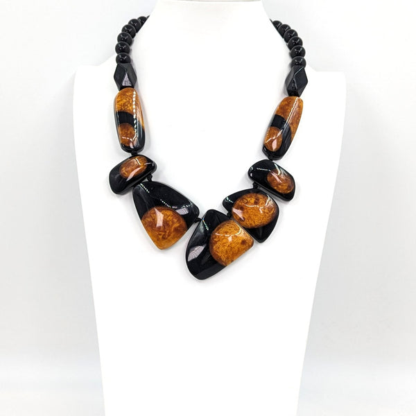 Organic shape beaded statement necklace with caramel accents