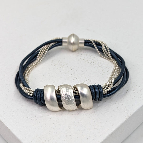 Swirl design on leather bracelet