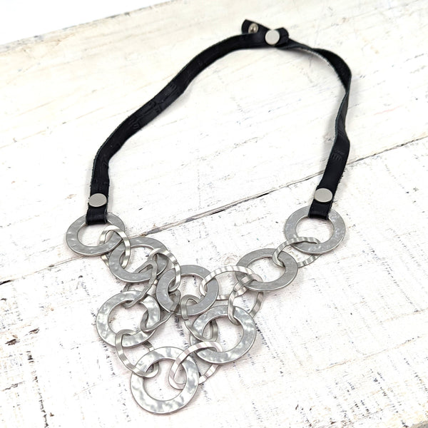 Matte Rhodium inter linked circle fall black leather necklace