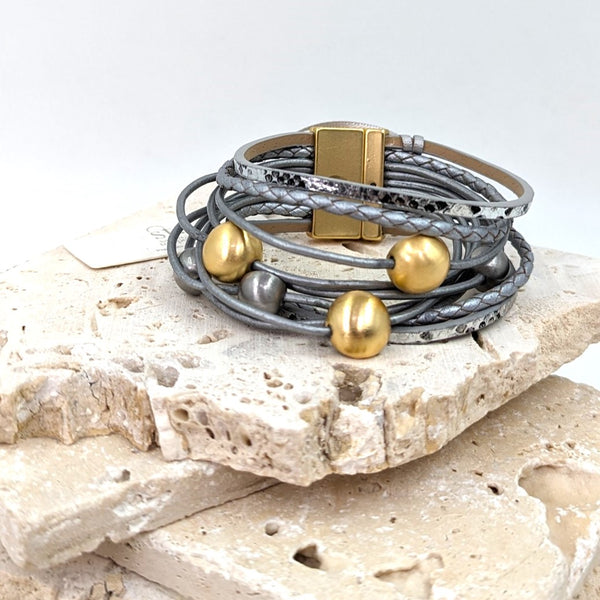 Brushed dome shape components on multi strand leather magnetic bracelet