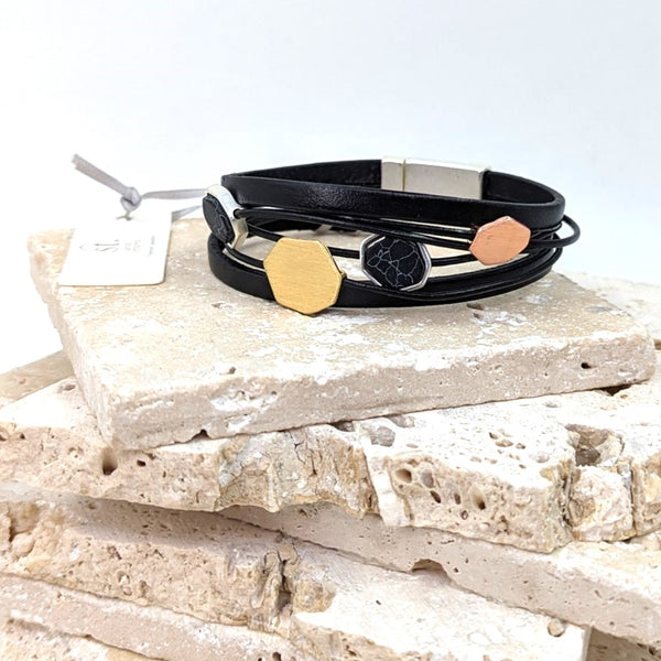 Geometric components on multi-strand leather magnetic bracelet