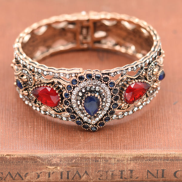 Jewelled victoriana bangle with teardrop  central feature