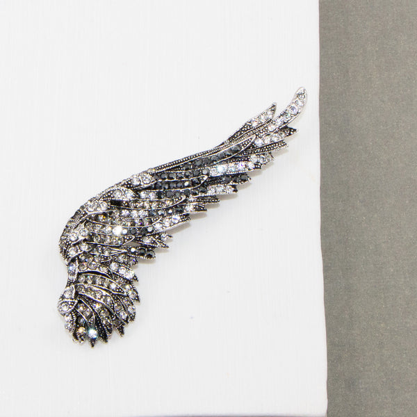 Luxury crystal encrusted angel wing brooch