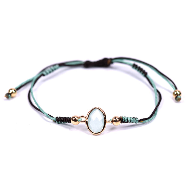 Simple beaded bracelet with small oval crystal
