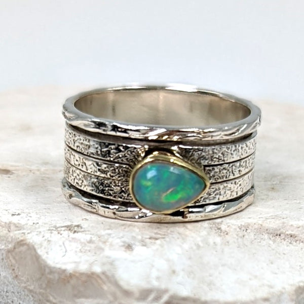 Ethiopian opal oval shape 925 spinning ring with brass setting
