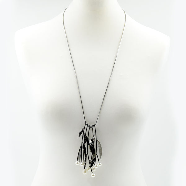 Long necklace with leaf & pearl style pendant