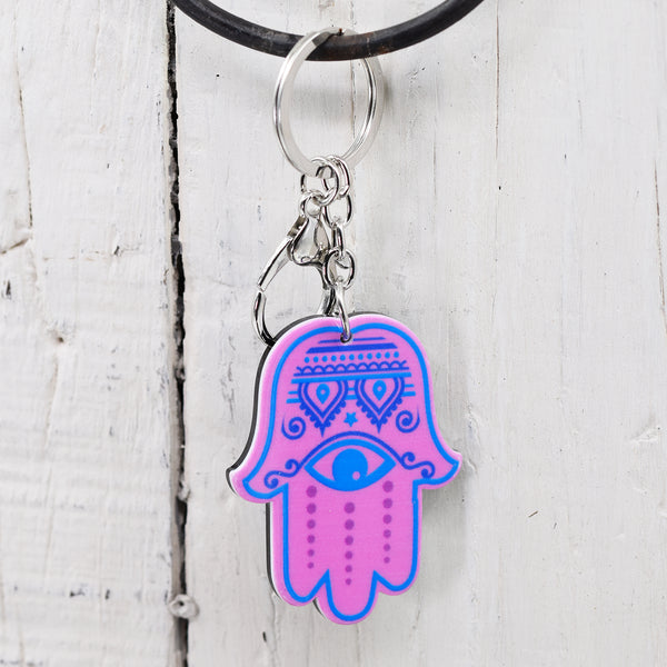 Pink and blue patterned hand of hamsa with eye keyring