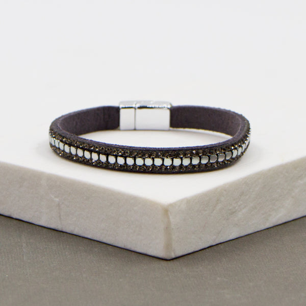 Simple single strand magnetic bracelet with mini silver circles center and black diamond edging