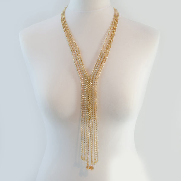 Long multi strand necklace with crystal droppers