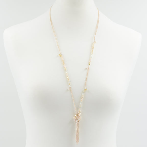 Delicate beaded long necklace with tassel pendant