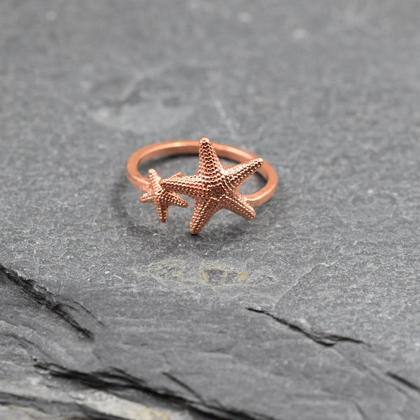Delicate open ring with little starfish