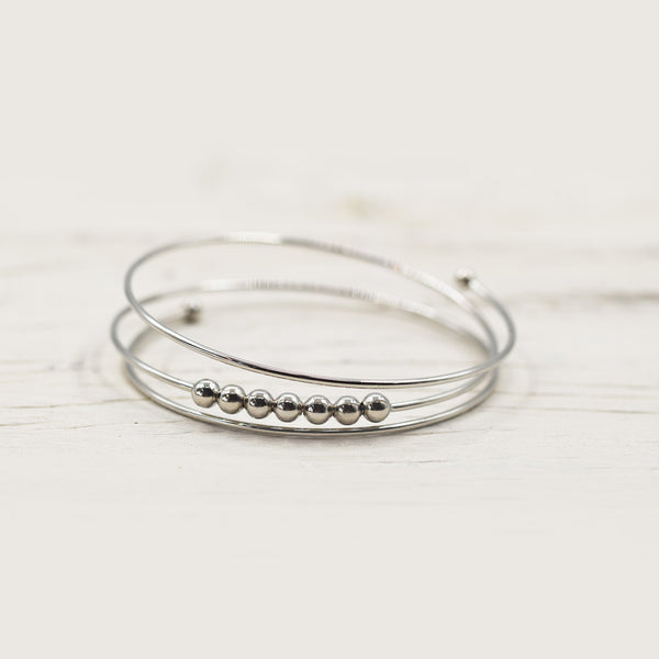 Spiral style bangle with small silver balls