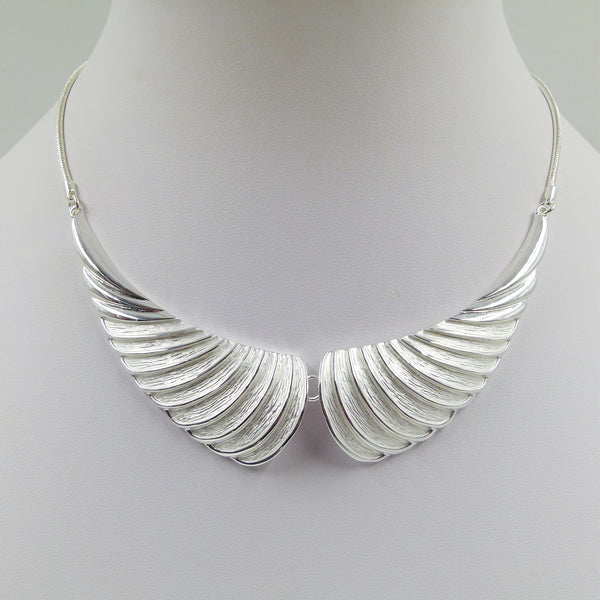 Contemporary wings style pendant on snake chain