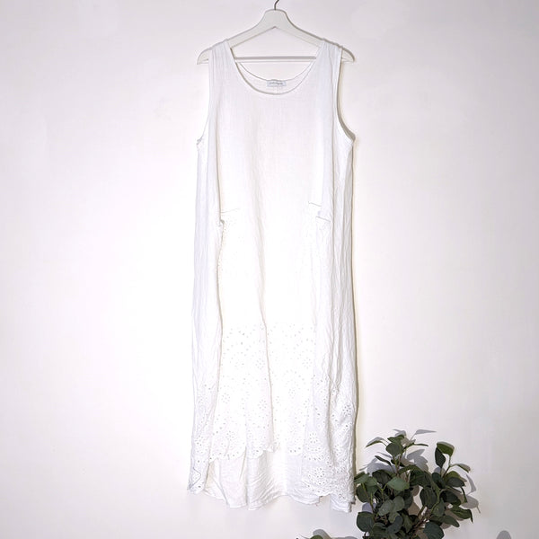 Hi-lo linen sleeveless dress with deep embroidery anglaise detail hem panel and pockets