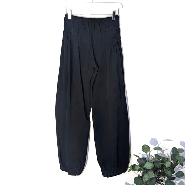 Fine corduroy balloon style trousers with deep elasticated waist band (M)