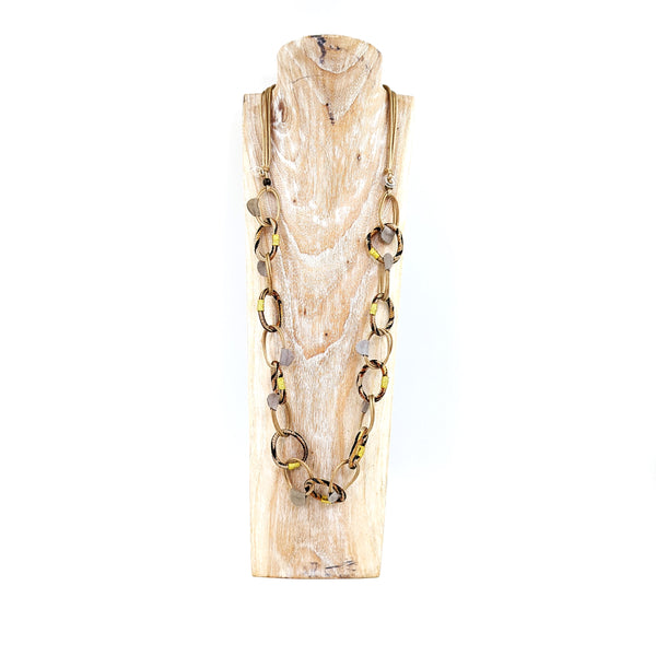 Luxury wax cord link necklace with suede pieces and golden fabric finishing