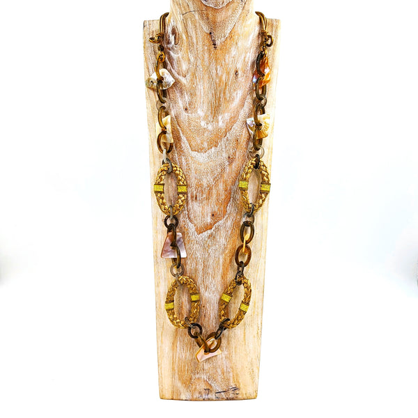 Luxury long resin link necklace with woven oval components and golden fabric finishing