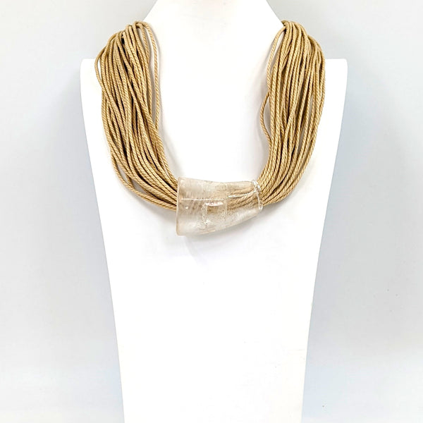Luxury multistrand cord necklace with one subtle pearlised resin and horn feature