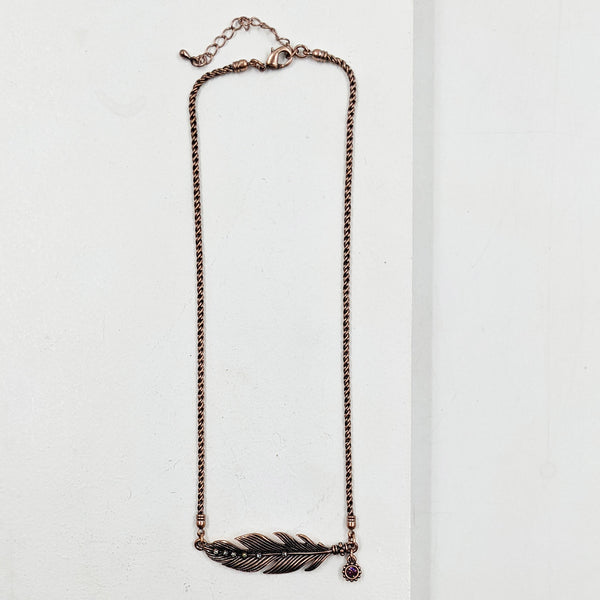 Vintage style feather pendant with crystals on short chain