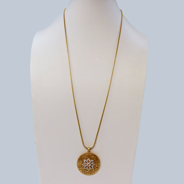 Circular Persian cut out flower pendant on long snake chain