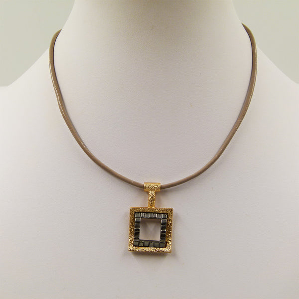 Contemporary cutout square pendant on short leather necklace