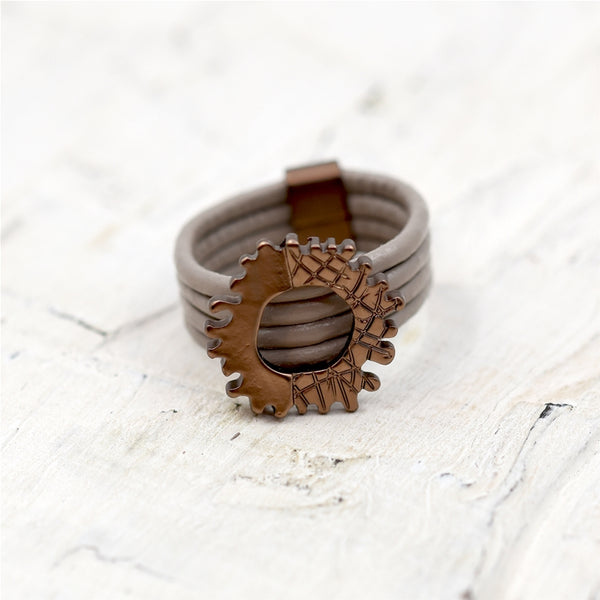 Litle cog style mix texture finish ring on multi leather
