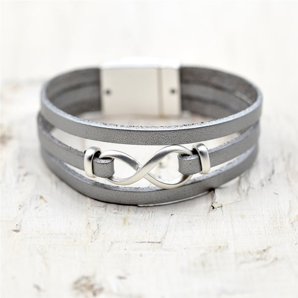 Infinity style design on triple leather bracelet w/mag clasp