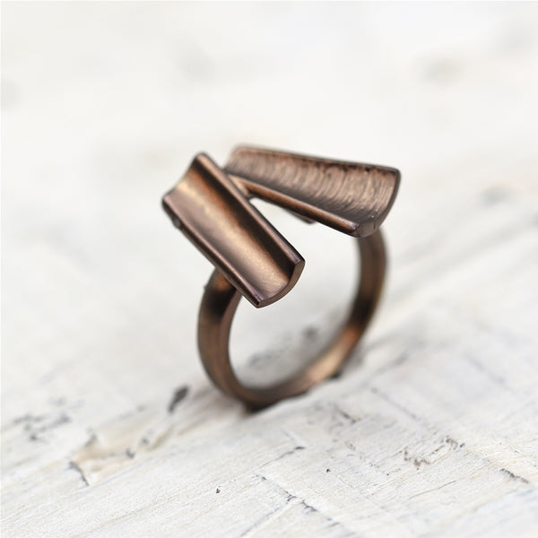 Geometric open tubes with mix texture finish ring