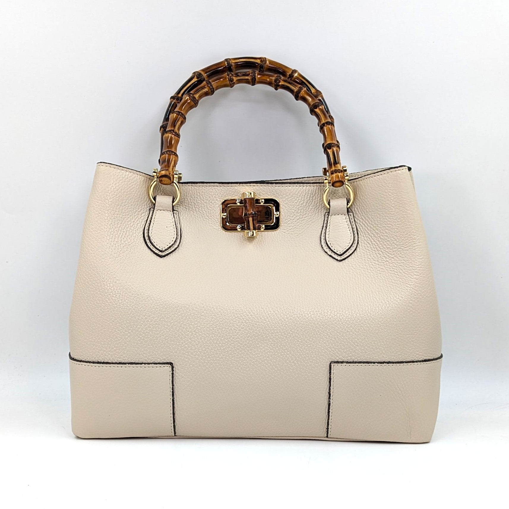 Super stylish leather handbag with bamboo handles and bamboo twist cla ...