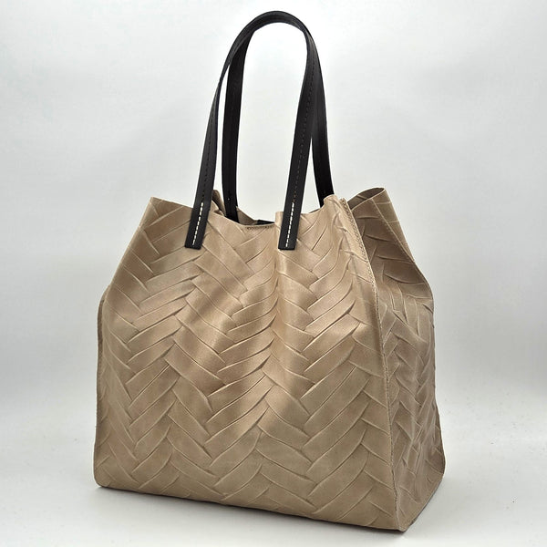 Leather herringbone imprint tote bag with luxe chocolate handles and substantial internal bag