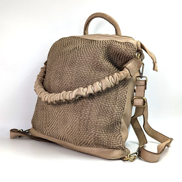 Luxe vintage wash multifunctional back pack and handbag with intricate woven design