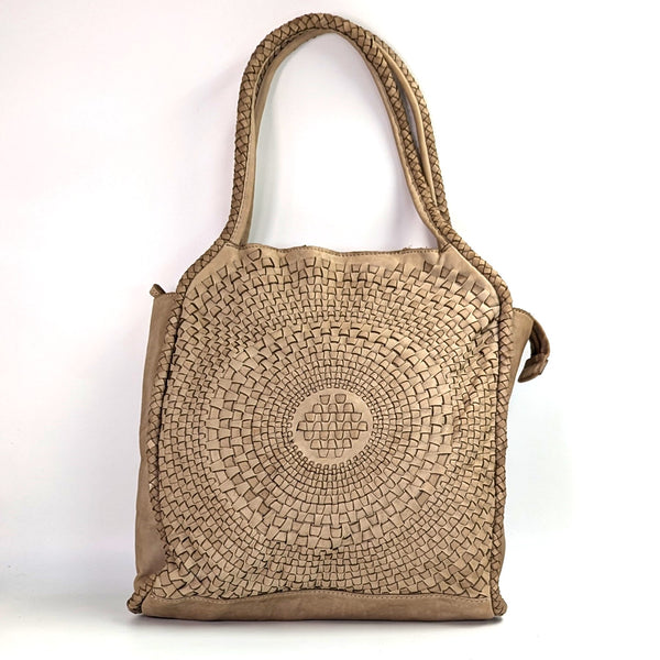 Luxe vintage wash tote bag with intricate circular woven design