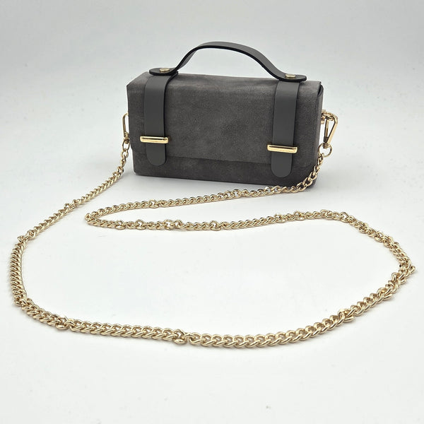 Suede mini boxy designer inspired handbag with chain crossbody strap and red interior