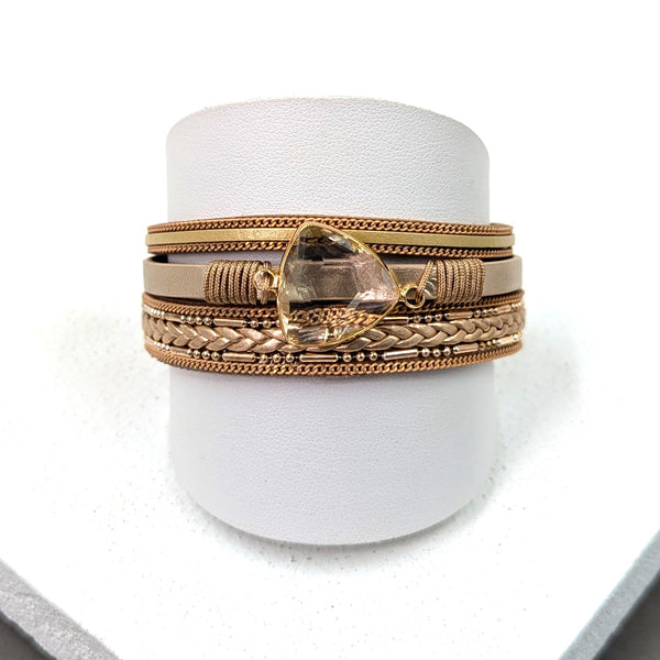 Multi strand PU magnetic cuff with plaited strand and crystal feature