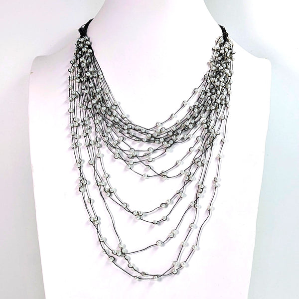 Waterfall mini pearl necklace on fine shiny thread