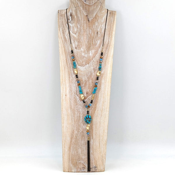 Mid length y-shape beaded necklace with tassel element