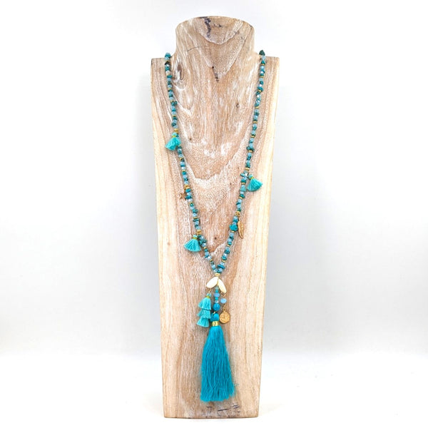 Long boho beaded necklace with semi-precious shells and tassels