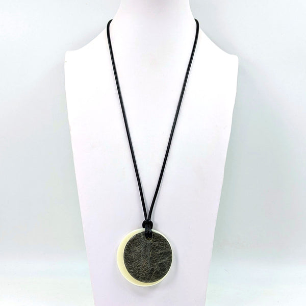Duo of round fibre effect resin shape on simple long wax cord