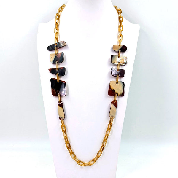 Flat rounded square resin shapes on long resin chain necklace
