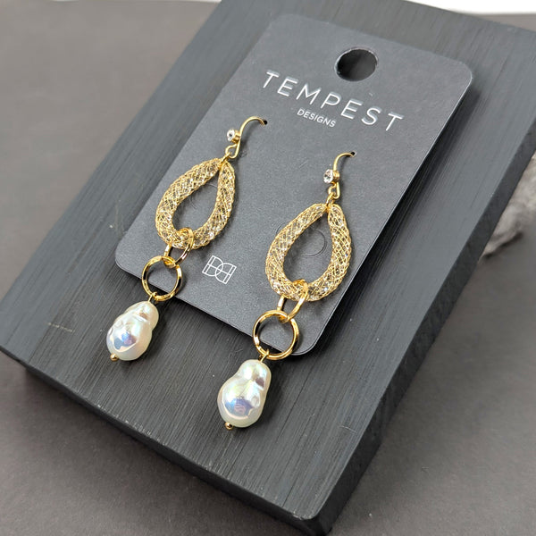 Crystal encased oval drop earrings with faux pearl