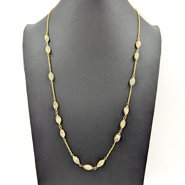 Delicate long rope chain necklace with little encased crystal sections
