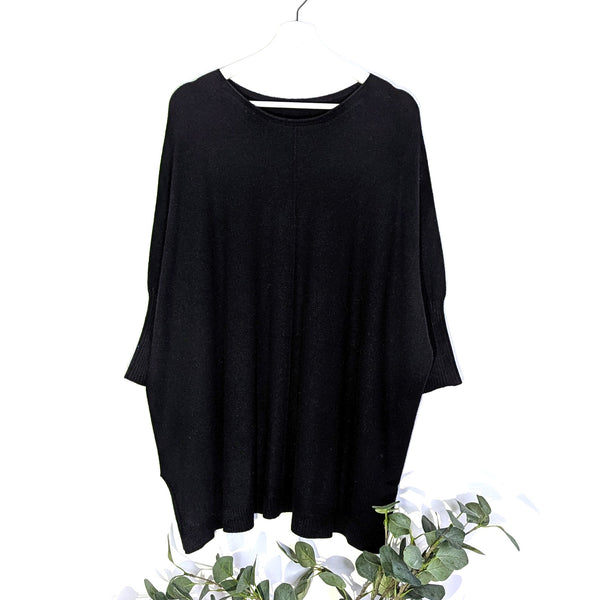 Viscose mix roomy jumper with central seam, ribbed 3/4 sleeves and side slits