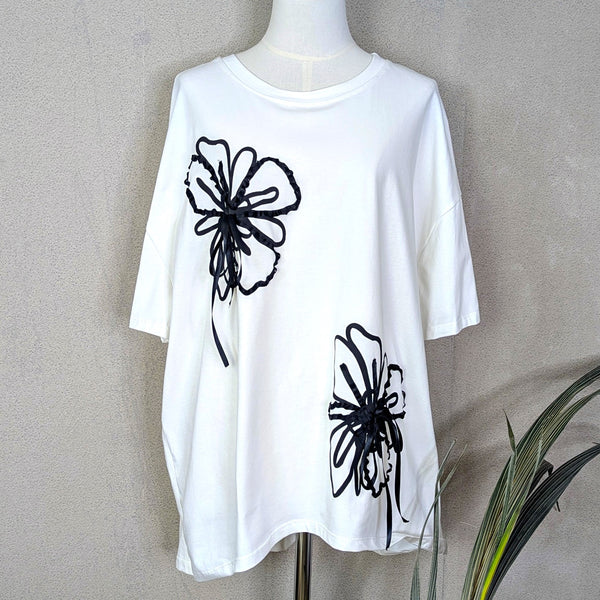 Hi-lo jersey top with flower and ribbon detail