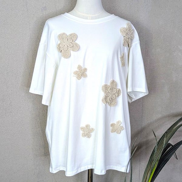 Jersey top with crochet flower detail