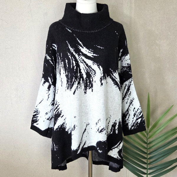 Roomy viscose mix sweeping design jumper with slight turtle neck