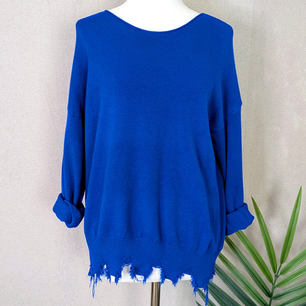 Super soft jumper with fashionable distressed hem line (S-M)