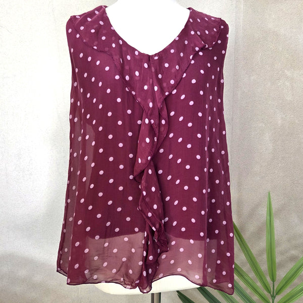 Silk sleeveless spotted top with frilled neckline