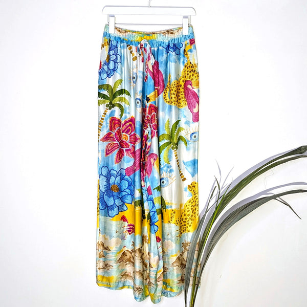 Luxe silk straight leg trousers with exotic island print and eyes (M-L)